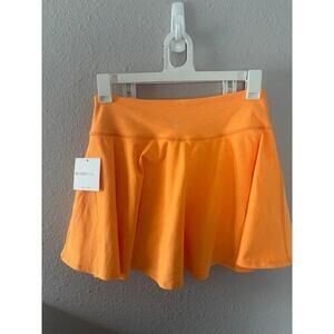 NWT Beyond Yoga High Waisted Skort size L orange. Small spot on front that will